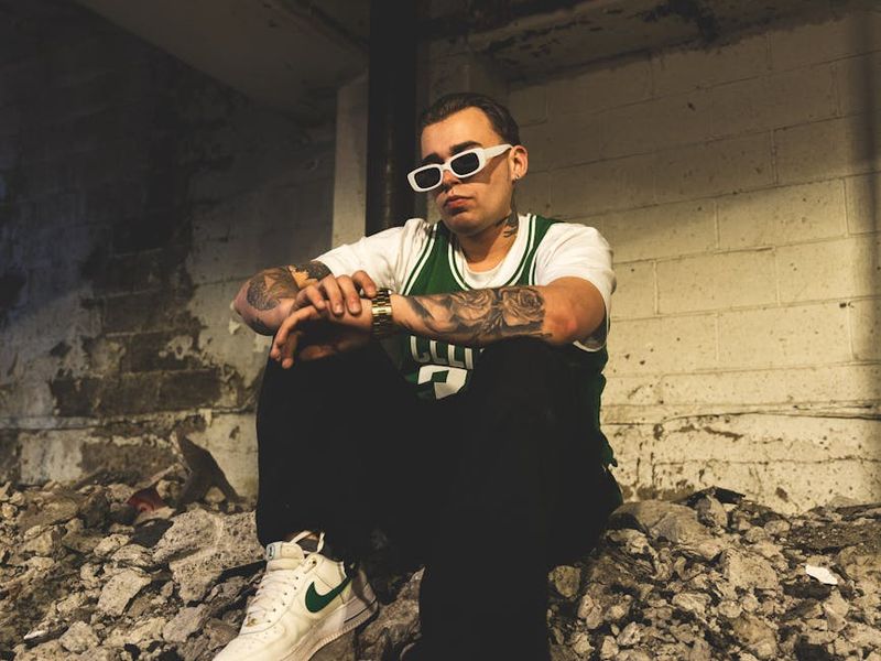 Wide view of a modern industrial style gym with neon lights